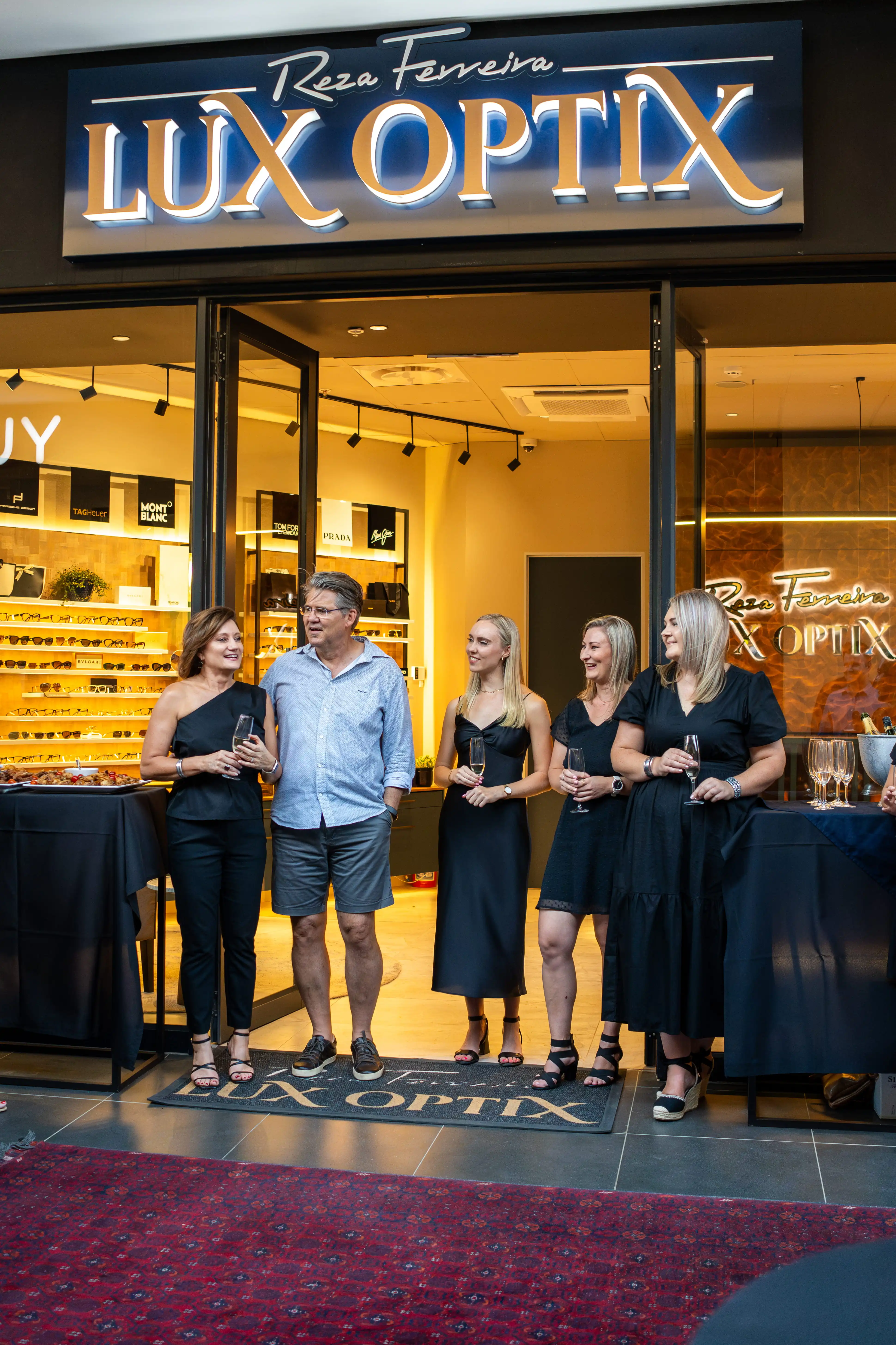 Reza Ferreira LuxOptix team standing at the entrance of the Parelberg Shopping Centre boutique